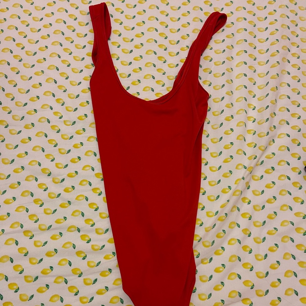 Red body suit